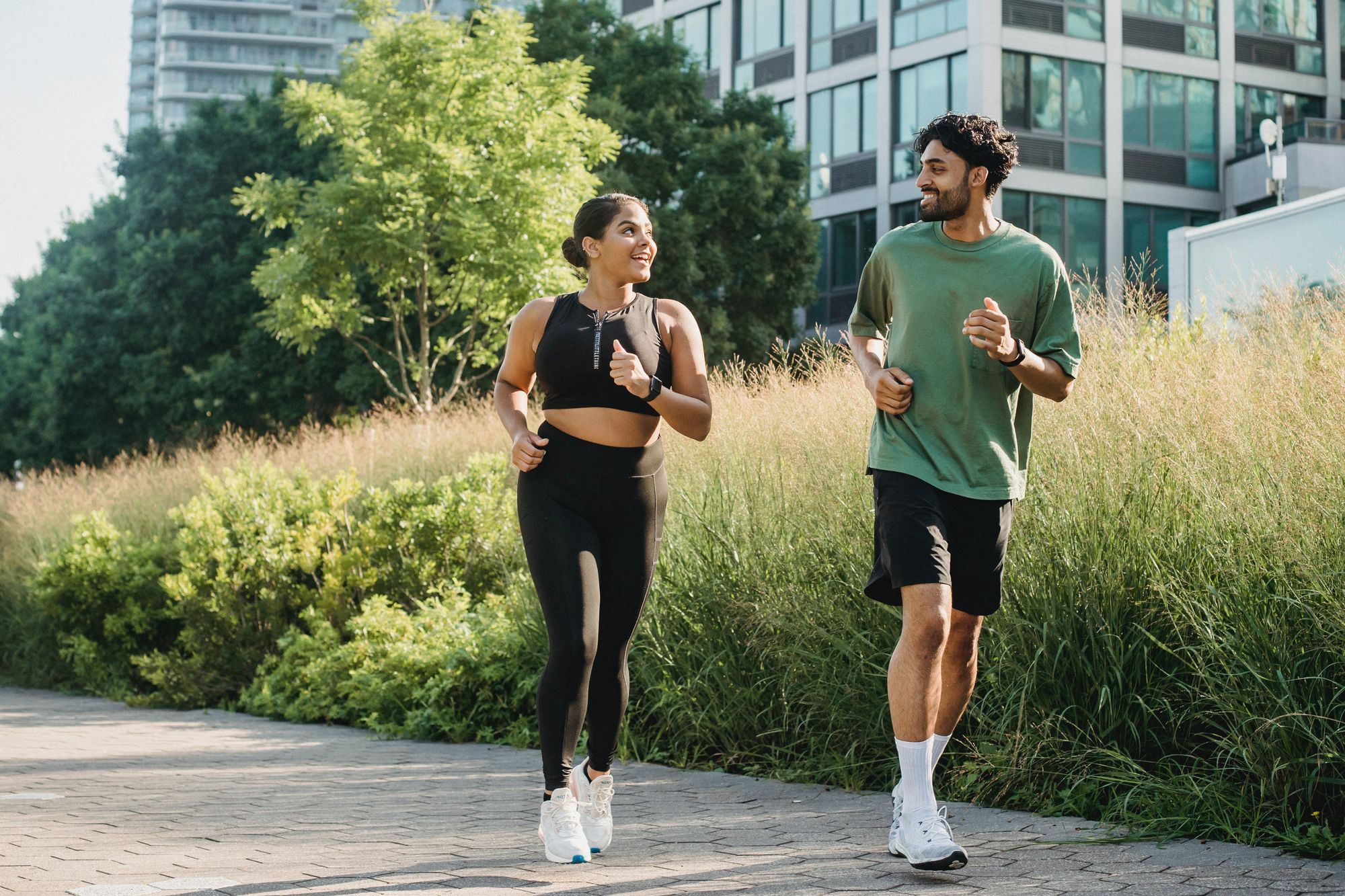 Two people running